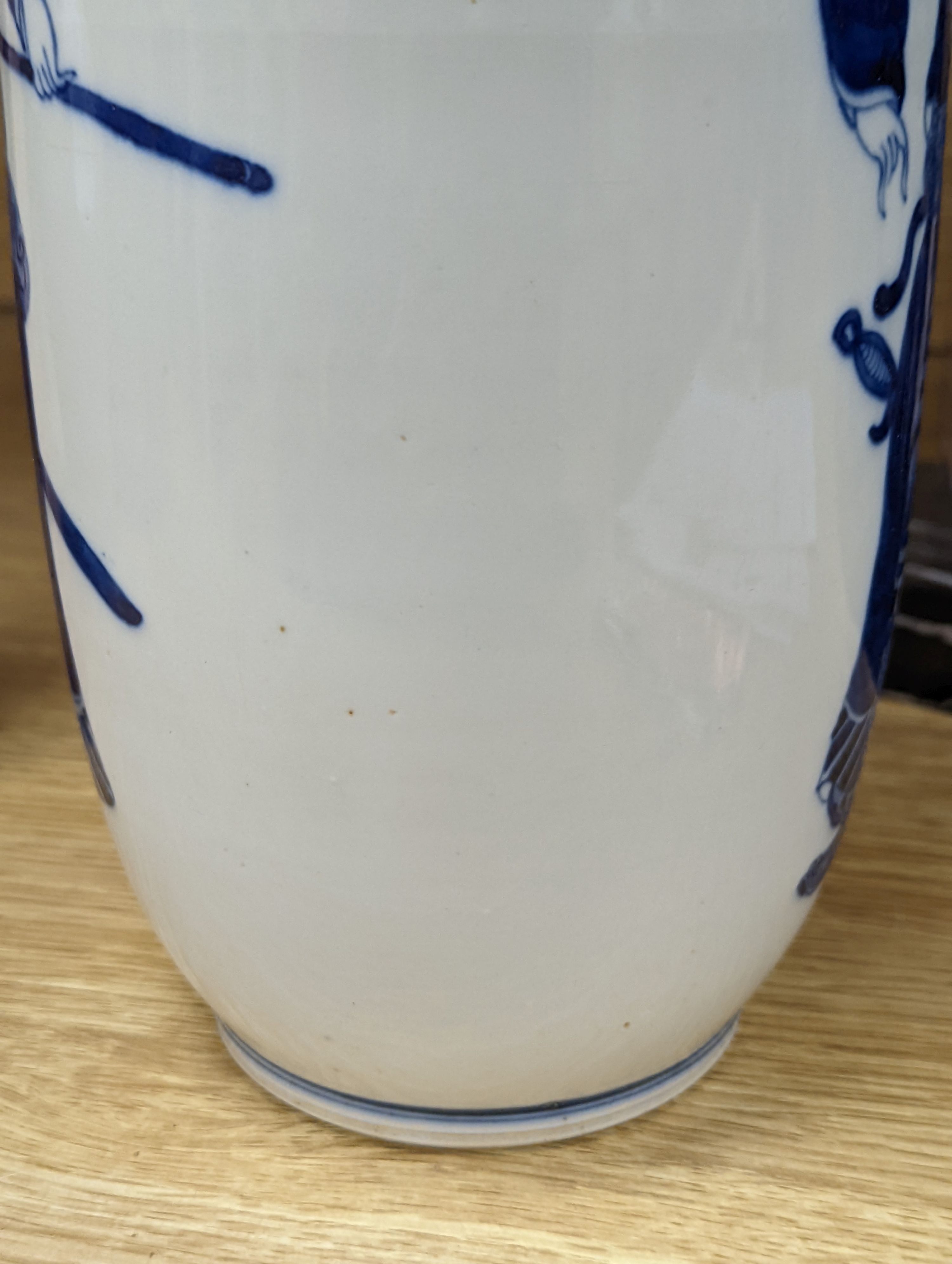 A Chinese blue and white rouleau vase, 35 cms.